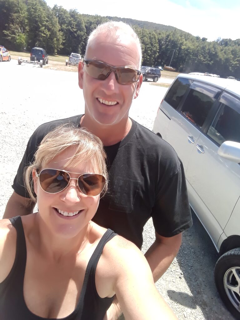 Selfie photo of Cruzar Campervan Conversions co-owners Brenda and Andy.