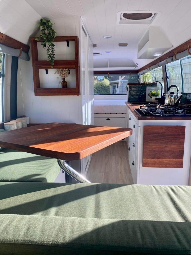 Interior view of a campervan conversion by Cruzar Custom Campervans.