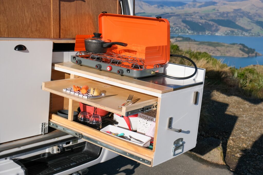 Exterior view of Madeleine's rear slide out cooker - A quirky campers campervan conversion