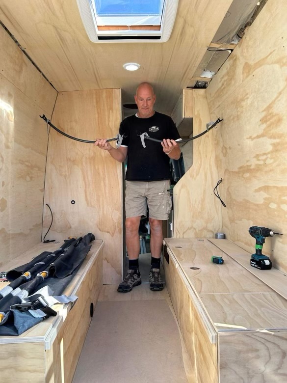 Cruzar Custom Campervans co-owner Andy at work on a campervan conversion