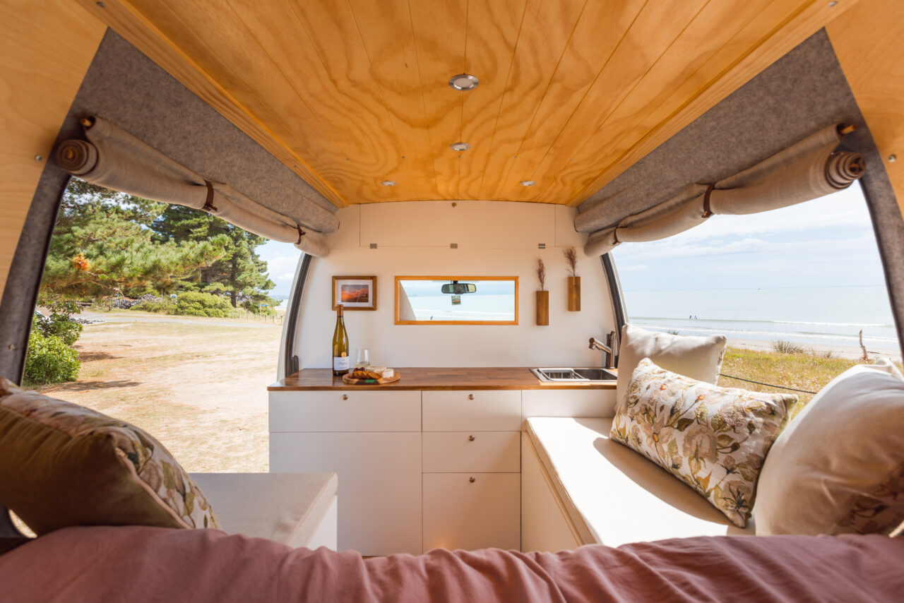 Interior of Carwyn, a handcrafted campervan for hire in Nelson