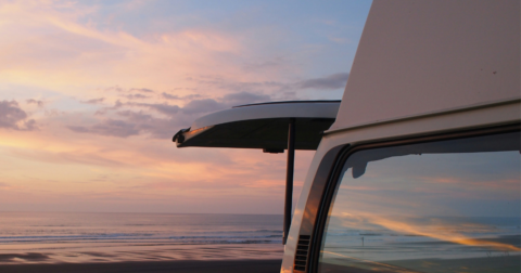 A campervan freedom camping near the beach