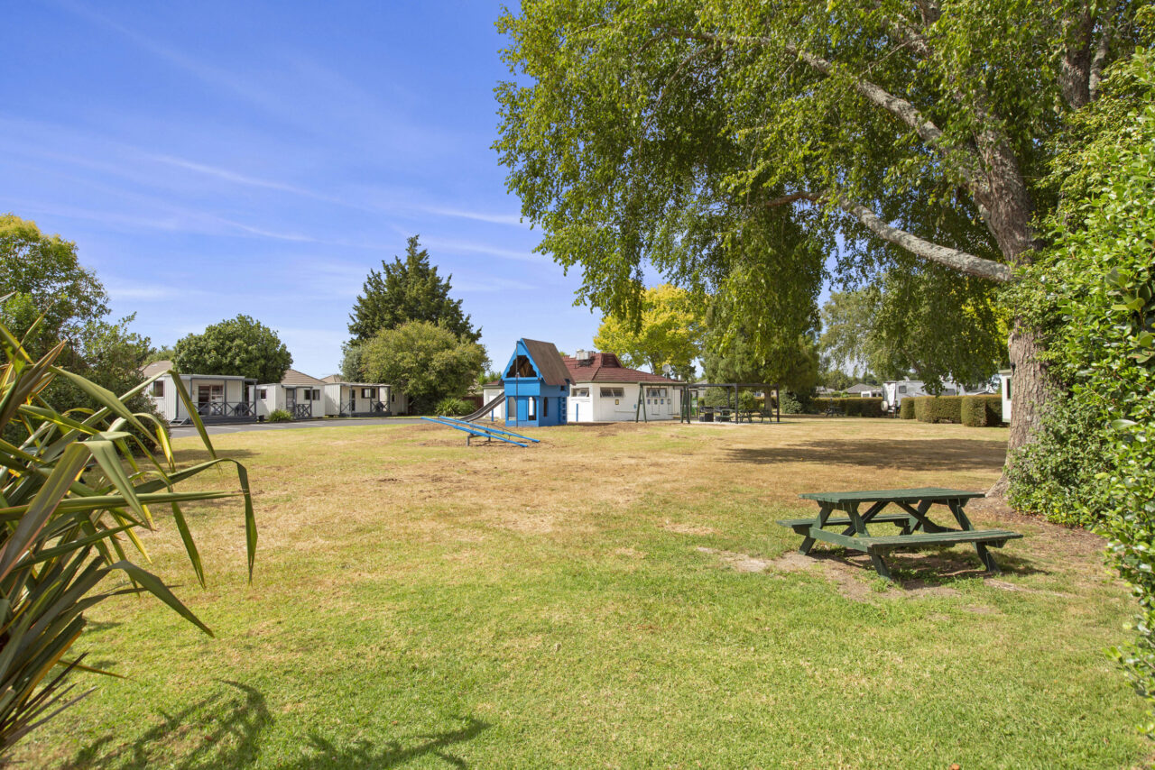 Swings and communial area at Hamilton City Holiday Park