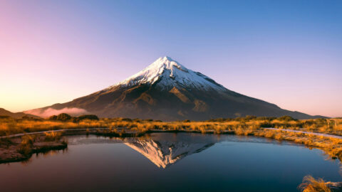 Iconic view of snow-peaked Mt Taranaka, North Island, NZ