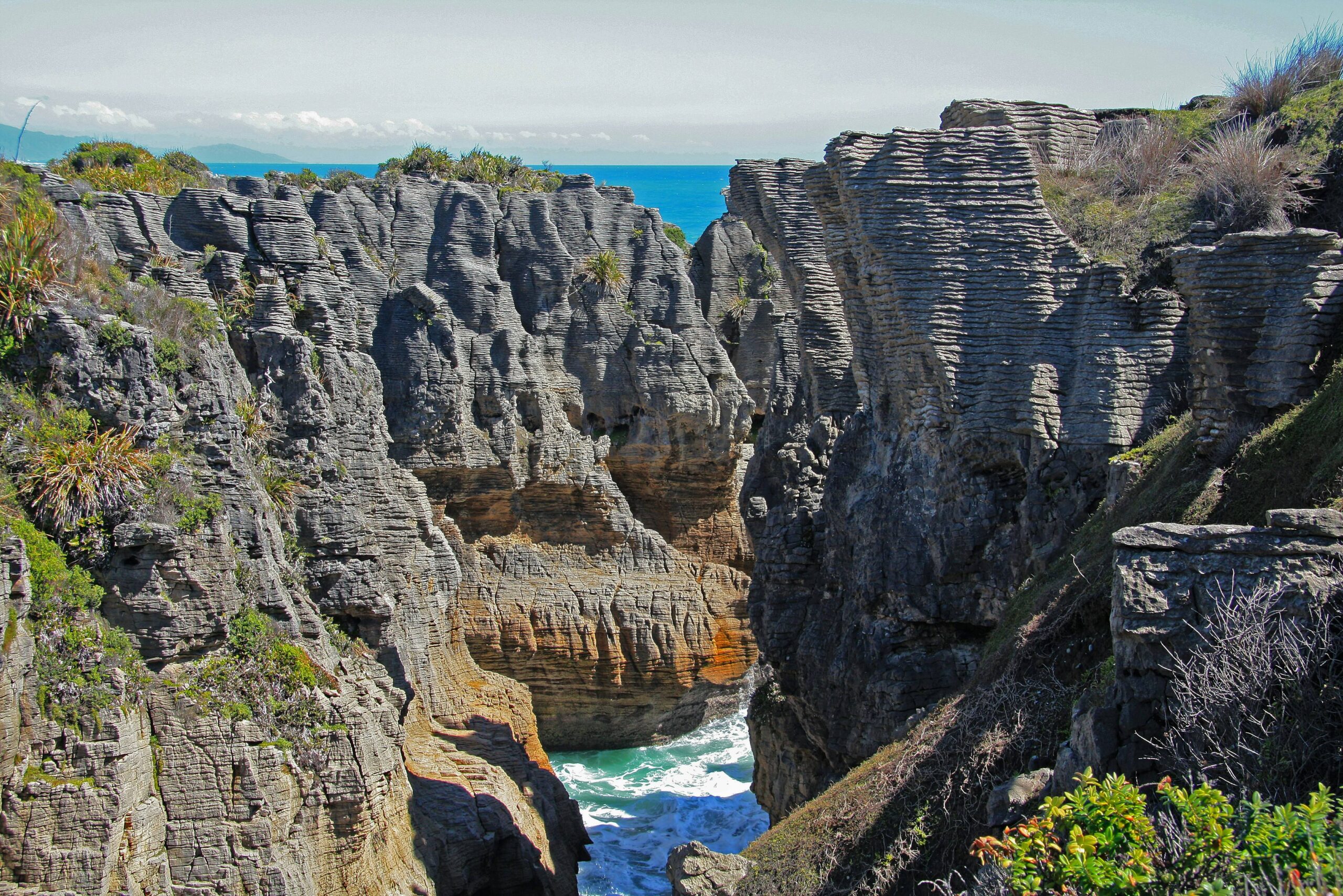 Layered limestone formations at the Pancake Rocks, Punakaiki