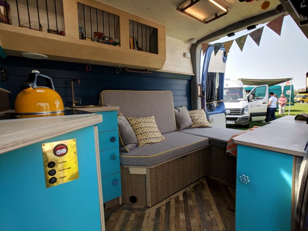 The inside of a campvervan at a campervan festival