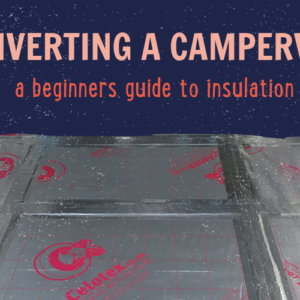 A partially insulated van with Celotex insulation boards displayed on the floor. Text at the top reads, "CONVERTING A CAMPERVAN - a beginners guide to insulation." The boards are silver with red Celotex branding, and the van's walls are visible in the background.